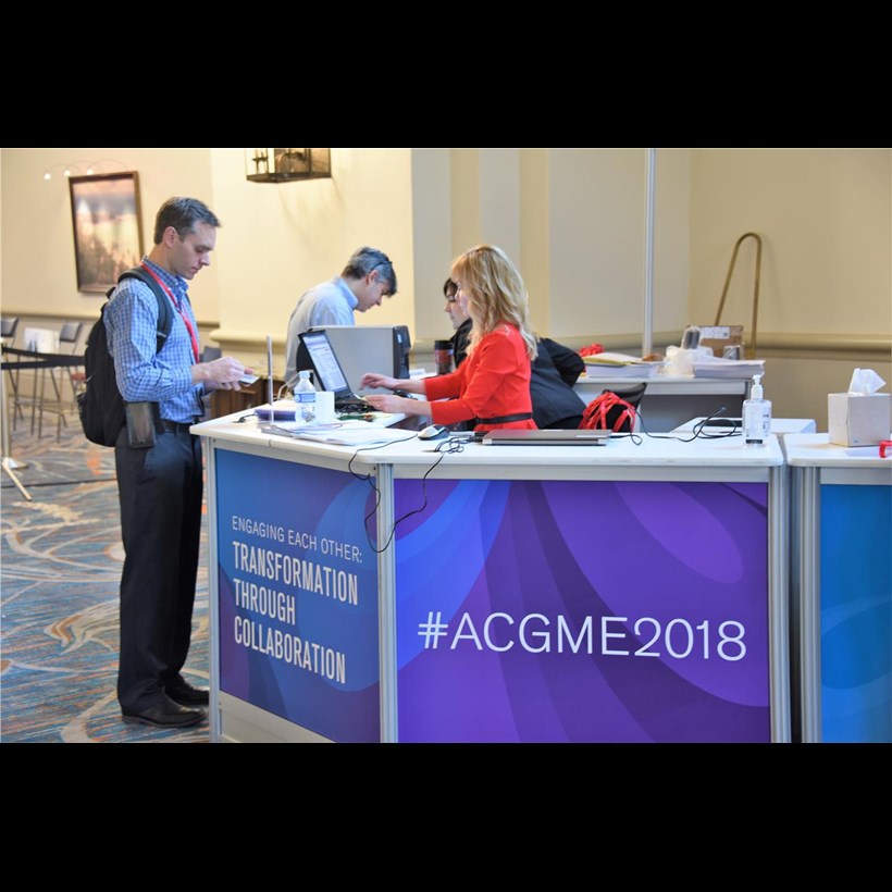Andrea Rio hard at work at the Information Booth at this spring&#39;s Annual Educational Conference in Orlando, Florida
