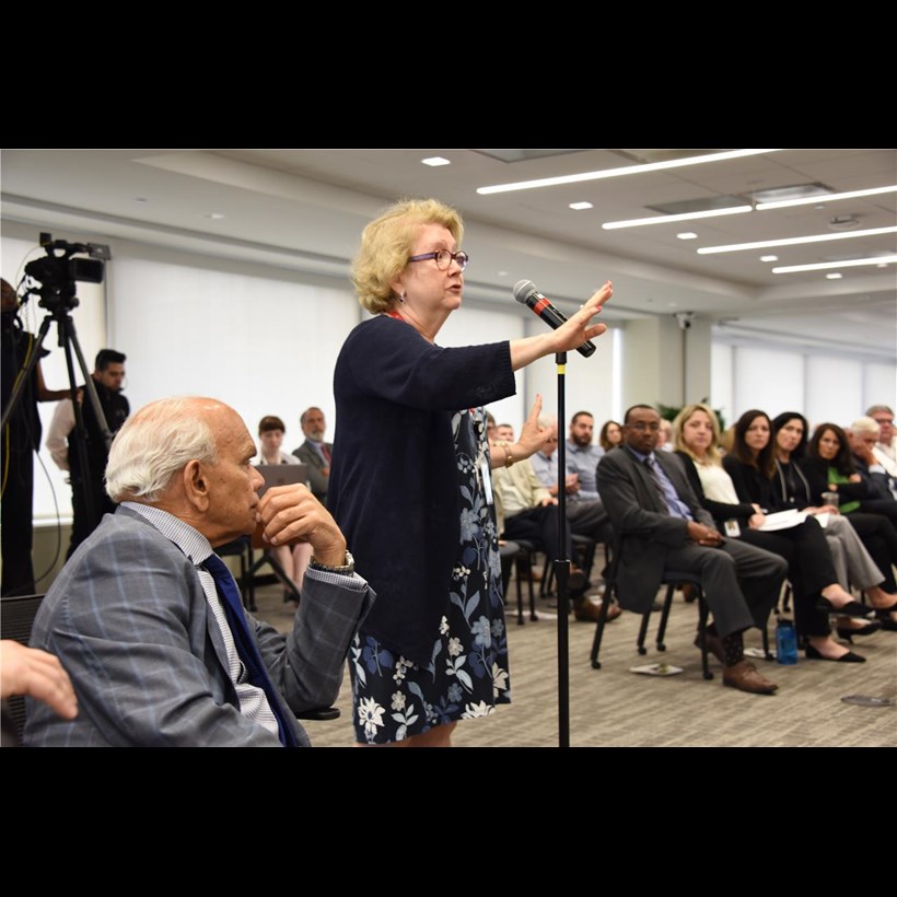 An audience member dialogues with Dr. Arno K. Kumagai during the Baldwin Seminar held June 26, 2019